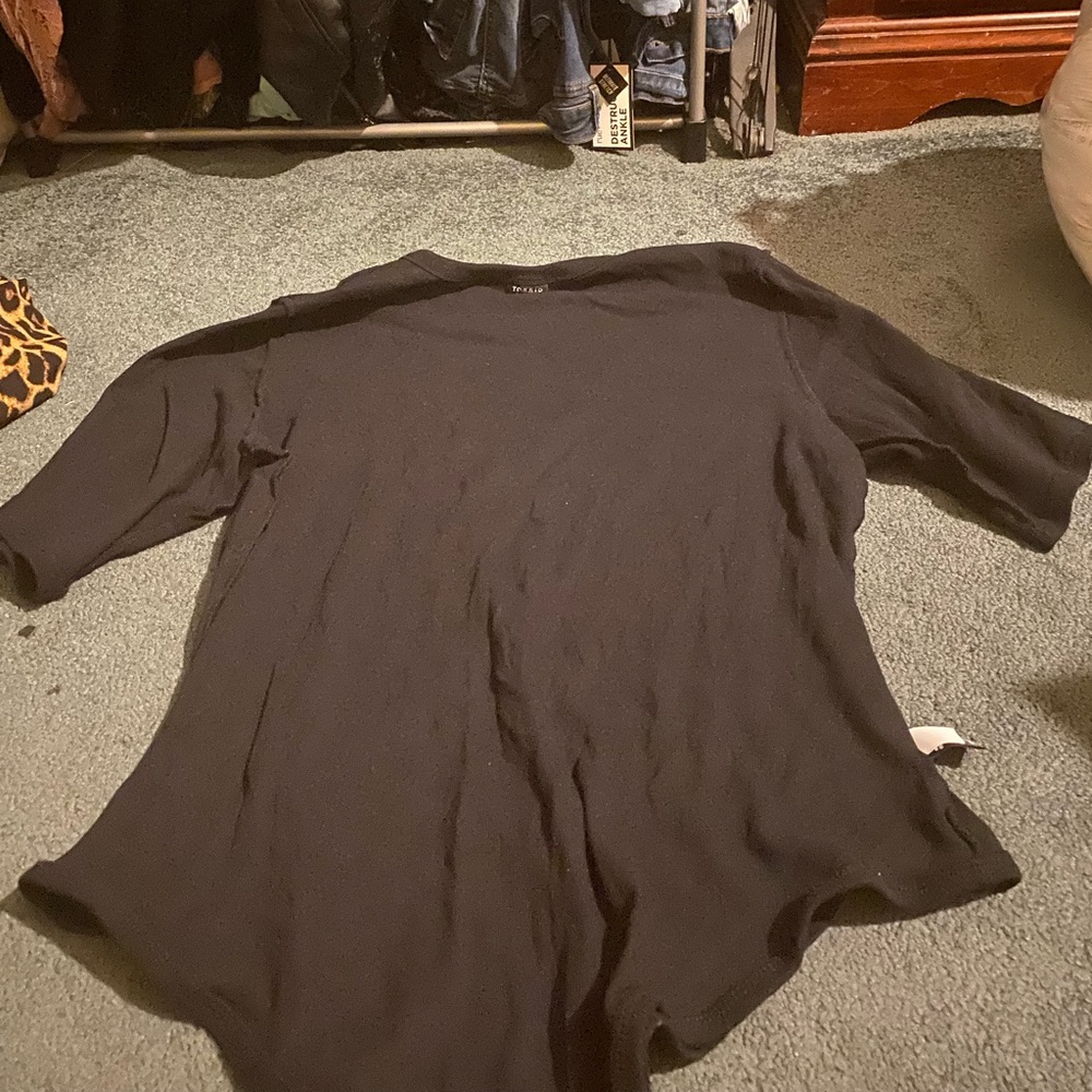 Black 3rd quarter sleeve button up body suit by torrid NEVER WORN